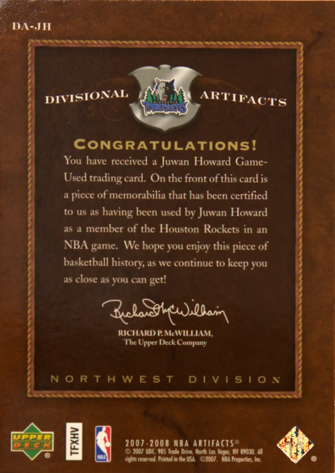 Back view of Juwan Howard 2007-08 UD Artifacts #DA-JH showing stats for Houston Rockets